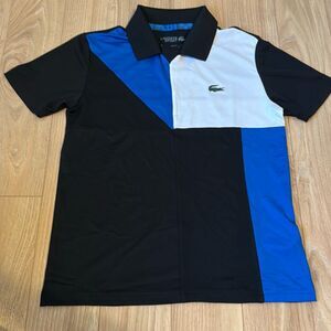 NWOT Lacoste boys sports kids blue black and white color block tennis polo size